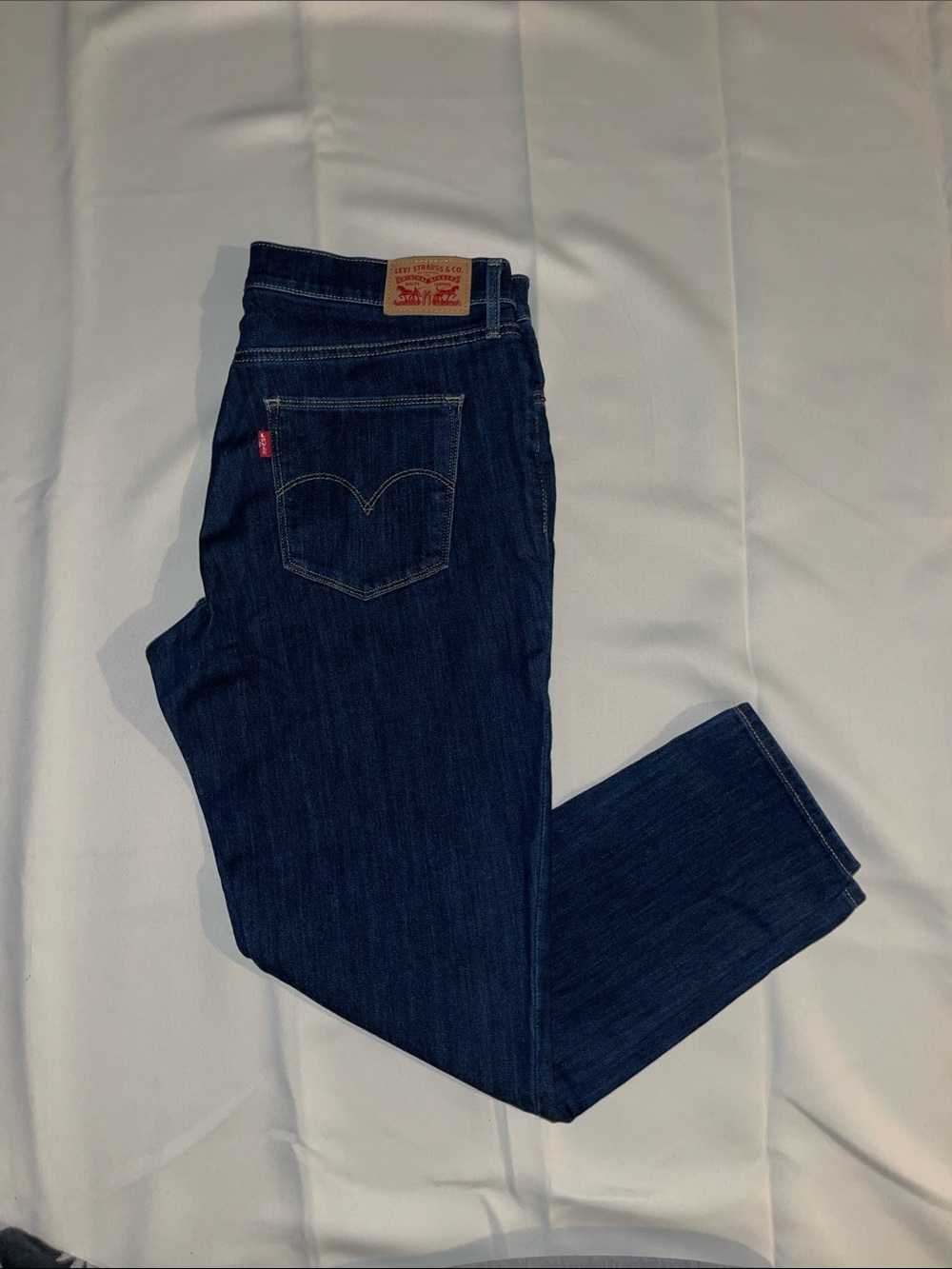 Levi's slimming skinny dark blue Slim Straight Jeans